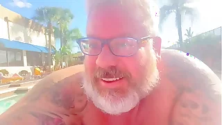 ejaculates secretly under his lounge chair at the mountains club pool