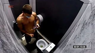 Hidden camera in a real public toilet / Russian guy jerks off and cums in the toilet